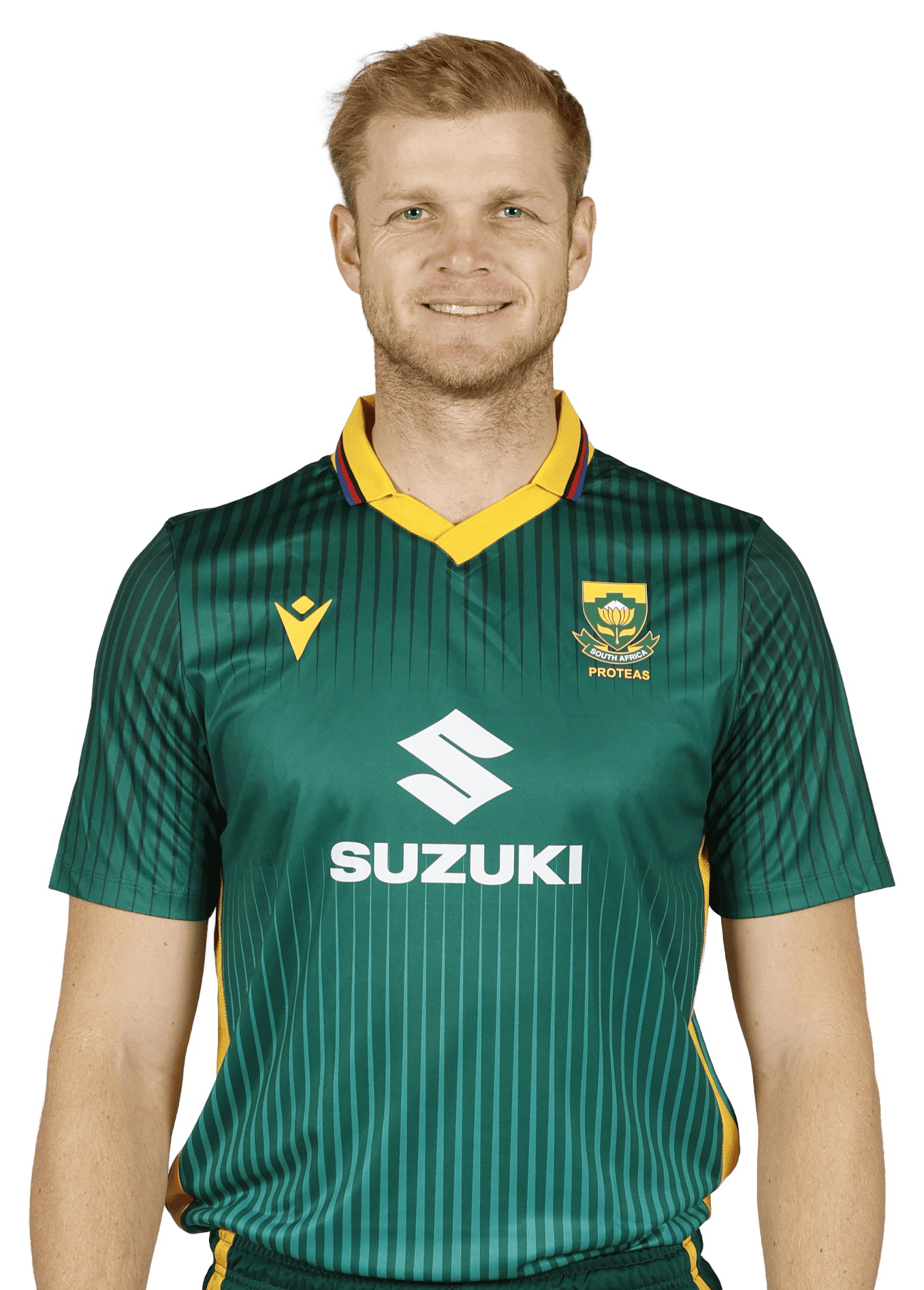Smiling man in a green South Africa Proteas soccer jersey with a yellow collar and Suzuki logo on the chest.